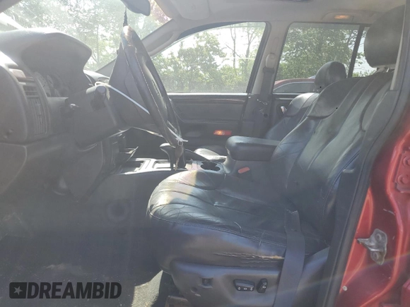 2002 Jeep Grand Cherokee Limited with VIN 1J4GW58N82C182603, listed as a Copart auction lot 57464295 with 240,179 mi miles and Salvage title. Bid and sale history available at DreamBid. Image 7.