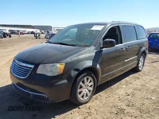 2014 Chrysler Town & Country Touring with VIN 2C4RC1BG4ER242768, listed as a IAAI auction lot 41683104 with 229,954 mi miles and . Bid and sale history available at DreamBid. Image 2.