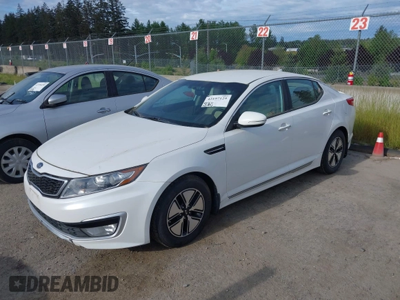 2012 Kia Optima Hybrid with VIN KNAGM4AD9C5011658, listed as a IAAI auction lot 42197129 with 142,977 mi miles. Bid and sale history available at carsss.com. Image 2.