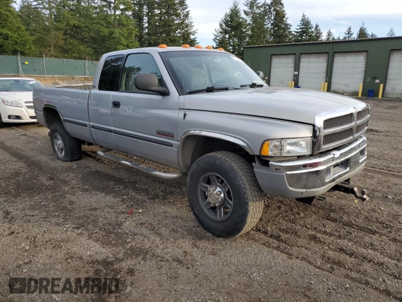 1999 Dodge Ram 2500 with VIN 1B7KF2362XJ504072, listed as a Copart auction lot 77649814 with 0 mi miles and Salvage Title. Bid and sale history available at carsss.com. Image 4.
