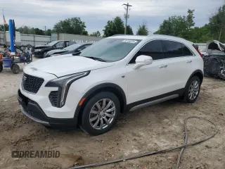2020 Cadillac XT4 FWD Premium Luxury z VIN 1GYFZCR41LF060002, wystawiony jako Copart lot #55750225 z przebiegiem 38 215 mil mil oraz Szkody całkowita. Historia ofert i sprzedaży dostępna na DreamBid. Obrazek 1.