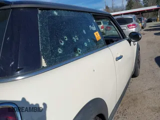 2009 MINI Hardtop S with VIN WMWMF73519TT99560, listed as a IAAI auction lot 41691939 with Not provided miles and . Bid and sale history available at DreamBid. Image 6.