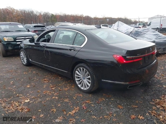 2020 BMW 7 Series 740i xDrive with VIN WBA7T4C03LGF97312, listed as a IAAI auction lot 40970033 with 60,231 mi miles. Bid and sale history available at carsss.com. Image 3.