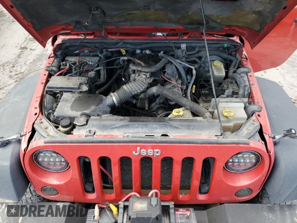 2007 Jeep Wrangler Unlimited Rubicon with VIN 1J4GA69177L102392, listed as a Copart auction lot 53195215 with 166,296 mi miles and Salvage title. Bid and sale history available at DreamBid. Image 12.