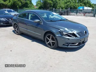 2014 Volkswagen CC Sport z VIN WVWBP7AN4EE505038, wystawiony jako IAAI lot #42331469 z przebiegiem 122 301 mil mil oraz . Historia ofert i sprzedaży dostępna na DreamBid. Obrazek 1.