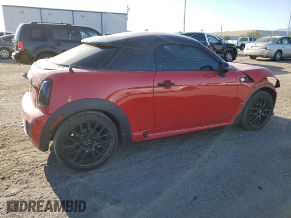 2015 MINI Coupe S z VIN WMWSX3C59FT409468, wystawiony jako Copart lot #71401384 z przebiegiem Nie podano mil oraz Szkoda całkowita • Salvage title. Historia ofert i sprzedaży dostępna na DreamBid. Obrazek 3.