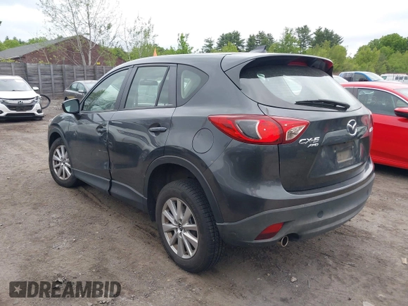 2016 Mazda CX-5 Sport with VIN JM3KE4BY9G0710004, listed as a IAAI auction lot 42323434 with 83,320 mi miles and . Bid and sale history available at DreamBid. Image 14.