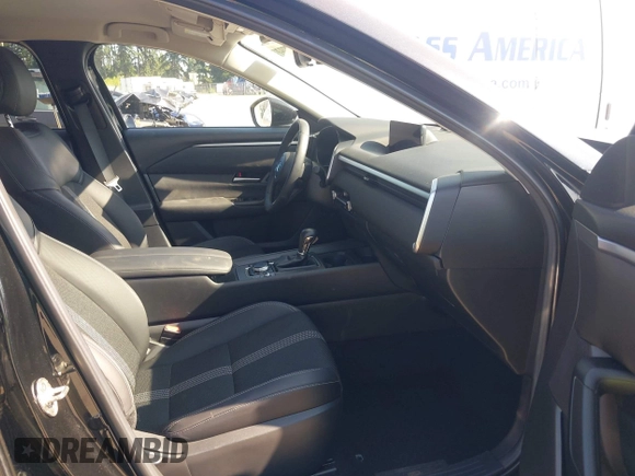 2025 Mazda CX-50 S Preferred with VIN 7MMVABBM9SN301063, listed as a IAAI auction lot 42801040 with 23,696 mi miles and . Bid and sale history available at DreamBid. Image 5.