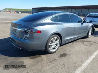 2014 Tesla Model S 60 with VIN 5YJSA1S10EFP32851, listed as a IAAI auction lot 41730746 with 91,657 mi miles and . Bid and sale history available at DreamBid. Image 4.