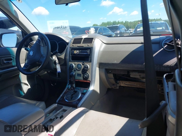 2009 Suzuki Grand Vitara z VIN JS3TE047094100192, wystawiony jako IAAI lot #42336959 z przebiegiem 244 995 mil mil oraz . Historia ofert i sprzedaży dostępna na DreamBid. Obrazek 5.