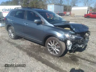 2015 Mazda CX-9 Grand Touring z VIN JM3TB3DV1F0449444, wystawiony jako IAAI lot #41769761 z przebiegiem 109 010 mil mil oraz . Historia ofert i sprzedaży dostępna na DreamBid. Obrazek 1.