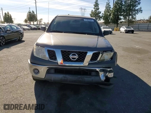 2009 Nissan Frontier SE with VIN 1N6AD07U49C405420, listed as a Copart auction lot 41983545 with 203,700 mi miles and Salvage title. Bid and sale history available at DreamBid. Image 11.