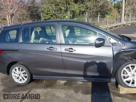 2014 Mazda 5 Touring with VIN JM1CW2CL3E0169367, listed as a IAAI auction lot 41673896 with 137,244 mi miles. Bid and sale history available at carsss.com. Image 13.