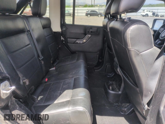 2012 Jeep Wrangler Unlimited Sahara z VIN 1C4HJWEG1CL168435, wystawiony jako Copart lot #58431615 z przebiegiem 120 364 mil mil oraz Szkoda całkowita • Salvage title. Historia ofert i sprzedaży dostępna na DreamBid. Obrazek 11.