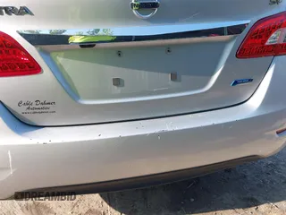 2014 Nissan Sentra SV with VIN 3N1AB7AP0EY334421, listed as a IAAI auction lot 42439951 with 107,788 mi miles and . Bid and sale history available at DreamBid. Image 19.