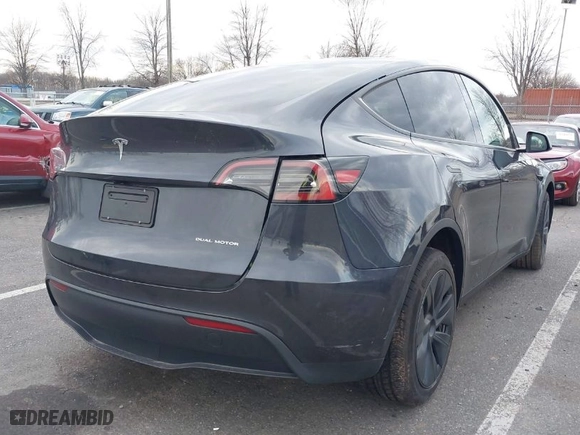 2024 Tesla Model Y Long Range with VIN 7SAYGDEE0RA330083, listed as a IAAI auction lot 41245099 with NaN miles. Bid and sale history available at carsss.com. Image 4.