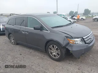 2012 Honda Odyssey EX-L with VIN 5FNRL5H62CB128914, listed as a IAAI auction lot 42623547 with 93,101 mi miles and . Bid and sale history available at DreamBid. Image 1.