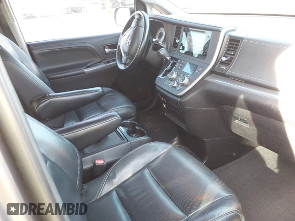 2015 Toyota Sienna SE with VIN 5TDXK3DC8FS633124, listed as a IAAI auction lot 41475935 with 182,921 mi miles and . Bid and sale history available at DreamBid. Image 5.