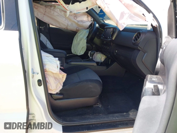2022 Toyota Tacoma SR with VIN 3TMCZ5AN4NM470000, listed as a IAAI auction lot 41629818 with 78,138 mi miles and . Bid and sale history available at DreamBid. Image 5.