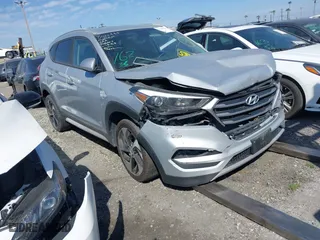 2017 Hyundai Tucson Value with VIN KM8J33A25HU468142, listed as a IAAI auction lot 41382131 with 1 mi miles. Bid and sale history available at carsss.com. Image 1.