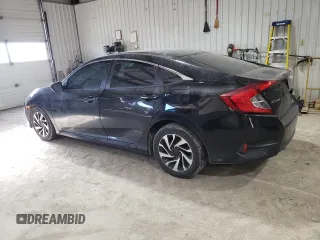 2016 Honda Civic Sedan LX with VIN 19XFC2F57GE248800, listed as a Copart auction lot 42562665 with 202,102 mi miles and Salvage Title. Bid and sale history available at carsss.com. Image 2.