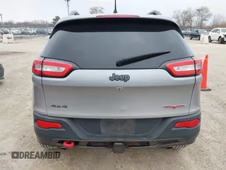 2016 Jeep Cherokee Trailhawk with VIN 1C4PJMBS7GW192574, listed as a IAAI auction lot 41986638 with 144,970 mi miles and . Bid and sale history available at DreamBid. Image 16.