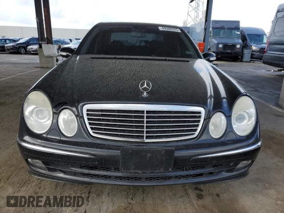 2005 Mercedes-Benz E 5.0L with VIN WDBUF70J45A761468, listed as a Copart auction lot 49500225 with 91,692 mi miles and Salvage Title. Bid and sale history available at carsss.com. Image 5.