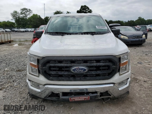 2021 Ford F-150 XL with VIN 1FTMF1EP7MKE72931, listed as a Copart auction lot 60650605 with 23,825 mi miles and Salvage title. Bid and sale history available at DreamBid. Image 5.