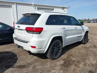 2017 Jeep Grand Cherokee Altitude with VIN 1C4RJFAG8HC768449, listed as a IAAI auction lot 41777272 with 72,913 mi miles and . Bid and sale history available at DreamBid. Image 4.