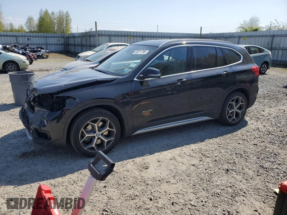 2017 BMW X1 xDrive28i with VIN WBXHT3C32H5F82141, listed as a Copart auction lot 53311785 with 52,867 mi miles and Salvage Title. Bid and sale history available at carsss.com. Image 1.