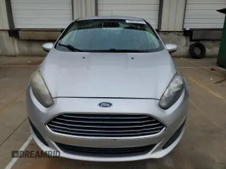 2016 Ford Fiesta SE z VIN 3FADP4BJ4GM203626, wystawiony jako Copart lot #54674475 z przebiegiem 127 194 mil mil oraz Szkoda całkowita • Salvage title. Historia ofert i sprzedaży dostępna na DreamBid. Obrazek 5.
