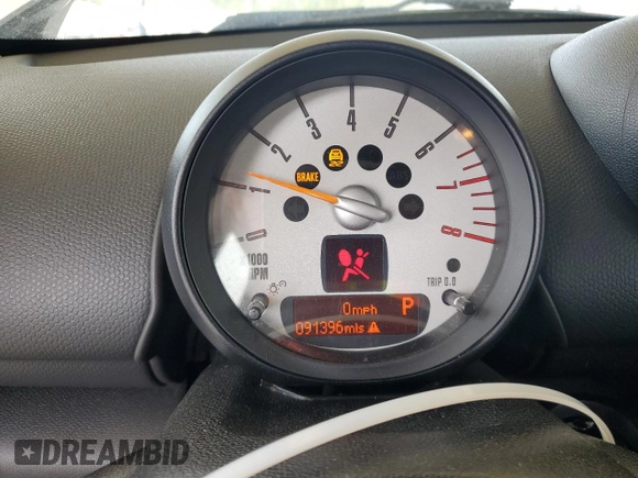 2014 MINI Countryman S with VIN WMWZC3C56EWP29211, listed as a Copart auction lot 52521145 with 91,396 mi miles and Salvage title. Bid and sale history available at DreamBid. Image 9.