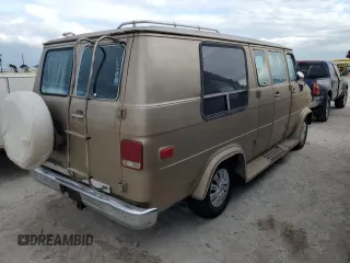 1989 Chevrolet Chevy Van z VIN 1GBEG25K2K7120100, wystawiony jako Copart lot #75508934 z przebiegiem Nie podano mil oraz Szkody całkowita. Historia ofert i sprzedaży dostępna na DreamBid. Obrazek 3.