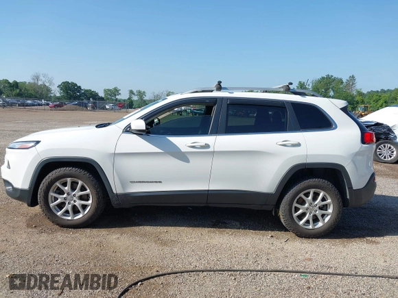 2016 Jeep Cherokee Latitude with VIN 1C4PJMCB7GW371955, listed as a IAAI auction lot 42562529 with 111,826 mi miles and . Bid and sale history available at DreamBid. Image 14.