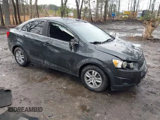 2014 Chevrolet Sonic LT with VIN 1G1JC5SH8E4234634, listed as a IAAI auction lot 41464054 with 117,113 mi miles and . Bid and sale history available at DreamBid. Image 1.