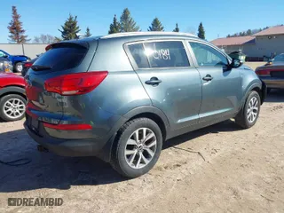 2014 Kia Sportage LX with VIN KNDPBCAC5E7579133, listed as a IAAI auction lot 41860184 with 114656 miles. Bid and sale history available at carsss.com. Image 4.