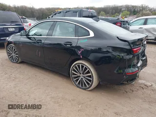 2021 BMW 2 Series 228i xDrive with VIN WBA73AK06M7H58799, listed as a IAAI auction lot 42172057 with 71,412 mi miles and . Bid and sale history available at DreamBid. Image 3.