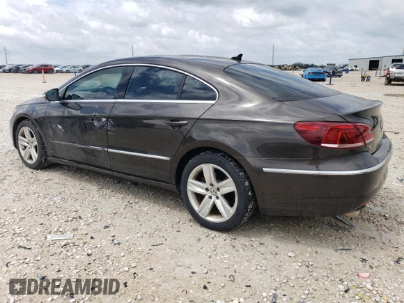 2014 Volkswagen CC R-Line with VIN WVWBN7ANXEE507477, listed as a Copart auction lot 58546374 with 73,792 mi miles and Salvage Title. Bid and sale history available at carsss.com. Image 2.