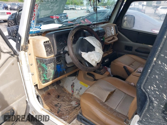 1998 Jeep Wrangler Sport with VIN 1J4FY19S5WP788331, listed as a IAAI auction lot 42027717 with 201,119 mi miles and . Bid and sale history available at DreamBid. Image 5.
