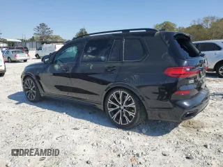 2022 BMW X7 M50i z VIN 5UXCX6C0XN9M94389, wystawiony jako Copart lot #49696505 z przebiegiem 22 908 mil mil oraz Szkody całkowita. Historia ofert i sprzedaży dostępna na DreamBid. Obrazek 2.