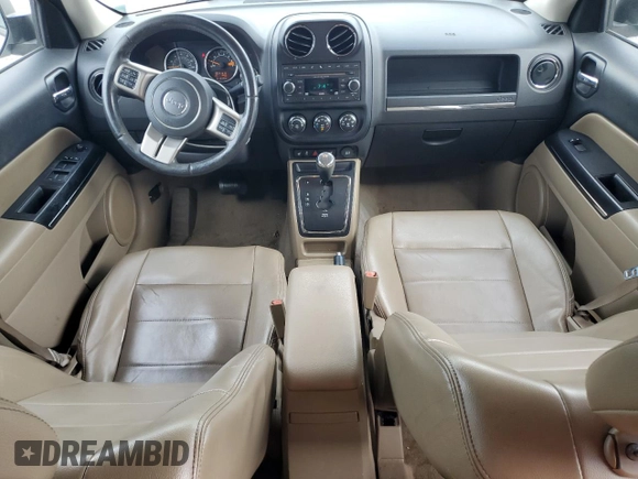 2014 Jeep Patriot Limited z VIN 1C4NJRCB1ED569802, wystawiony jako Copart lot #58661365 z przebiegiem 213 294 mil mil oraz Czysty tytuł • Clean title. Historia ofert i sprzedaży dostępna na DreamBid. Obrazek 8.
