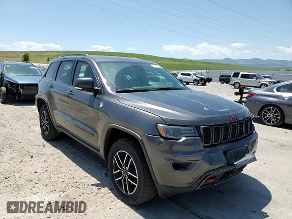 2020 Jeep Grand Cherokee Trailhawk с VIN 1C4RJFLT8LC177606, выставлен на аукционе Copart как лот 61678385 с пробегом 127 421 миль миль и Списание • Salvage title. История ставок и продаж доступна на DreamBid. Изображение 14.