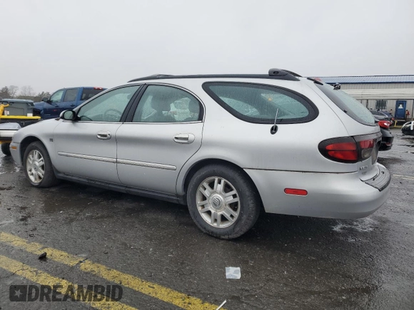 2004 Mercury Sable LS Premium with VIN 1MEHM59S54A605655, listed as a Copart auction lot 82005284 with 101,723 mi miles and Salvage Title. Bid and sale history available at DreamBid. Image 2.