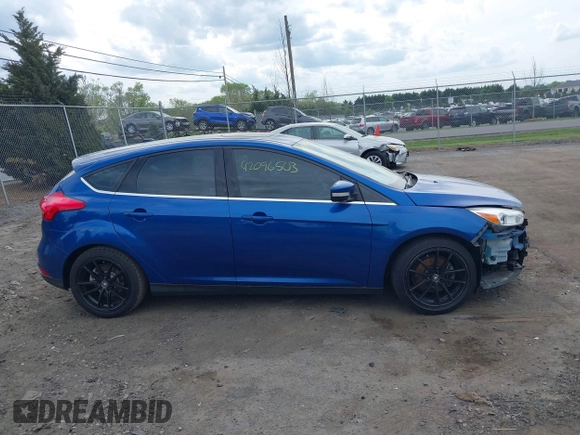 2018 Ford Focus Titanium z VIN 1FADP3N26JL325931, wystawiony jako IAAI lot #42096503 z przebiegiem 106 338 mil mil oraz . Historia ofert i sprzedaży dostępna na DreamBid. Obrazek 13.