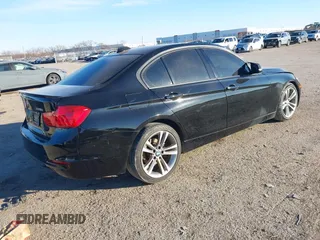 2014 BMW 3 Series 328i with VIN WBA3C1C5XEK112525, listed as a IAAI auction lot 41344289 with 114,525 mi miles. Bid and sale history available at carsss.com. Image 4.