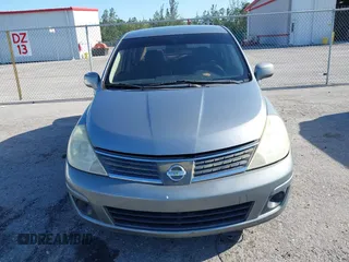 2009 Nissan Versa 1.8 S with VIN 3N1BC11E09L377706, listed as a IAAI auction lot 42027981 with 146,105 mi miles. Bid and sale history available at carsss.com. Image 12.