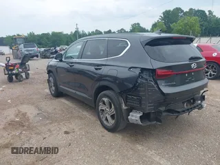 2021 Hyundai Santa Fe SE with VIN 5NMS14AJ5MH346250, listed as a IAAI auction lot 42299607 with 50,643 mi miles and . Bid and sale history available at DreamBid. Image 3.