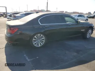 2015 BMW 7 Series 740Li with VIN WBAYE4C52FD946831, listed as a Copart auction lot 49014195 with 137,447 mi miles and Salvage Title. Bid and sale history available at DreamBid. Image 3.