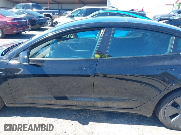 2022 Tesla Model 3 Long Range with VIN 5YJ3E1EB3NF104313, listed as a IAAI auction lot 41832803 with 39,061 mi miles and . Bid and sale history available at DreamBid. Image 14.