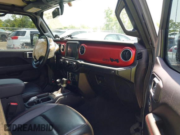 2021 Jeep Gladiator Rubicon with VIN 1C6JJTBG2ML515932, listed as a IAAI auction lot 42471704 with 57,775 mi miles and . Bid and sale history available at DreamBid. Image 5.